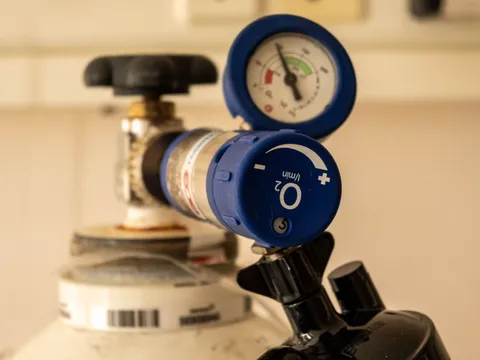 A regulator and gauge fitted to an oxygen cylinder