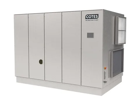 A large stainless steel adsorption dehumidifier with an air intake grille