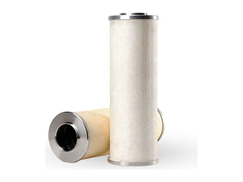 Two coalescing filter elements, one standing and one lying on its side