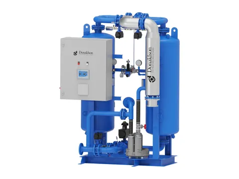 A compact twin-tower heated desiccant dryer with its control cabinet on the side