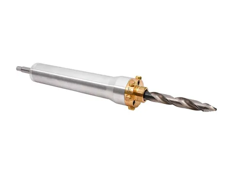 A hot tapping drilling device with its drill bit and brass drill holder