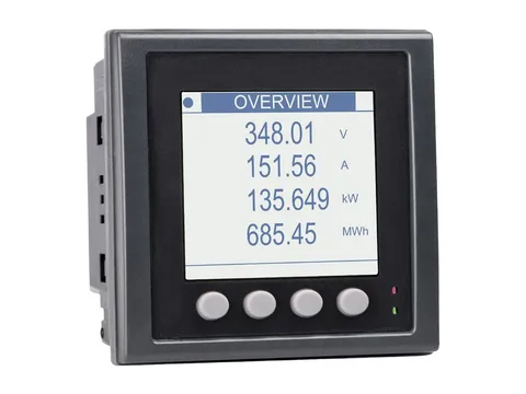 A panel-mounted power meter with a display reading volts, amps, kW and MWh